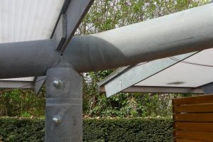Carports Senioren-Wohnstift Bonn Bornheim Stahlbau Träger gekrümmt Detail Knoten Glasdach